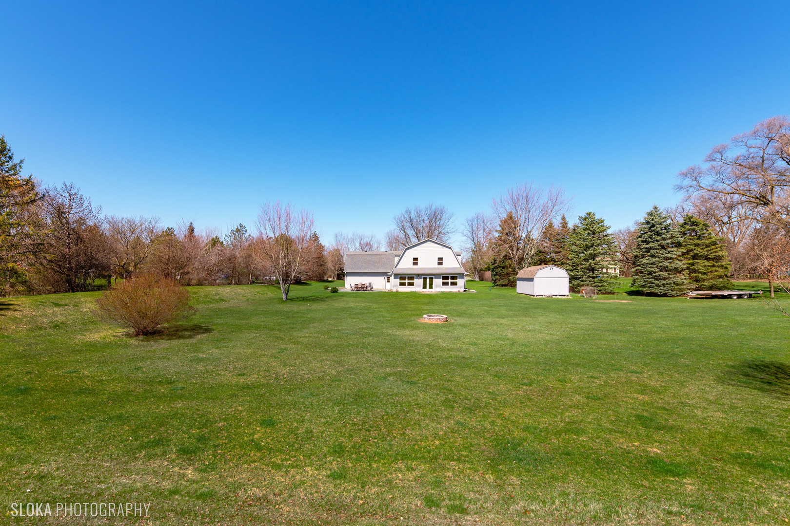 2401 West Wright Road Prairie Grove, IL 60012 - Photo 49 of 60 a backyard of a house with lots of green space