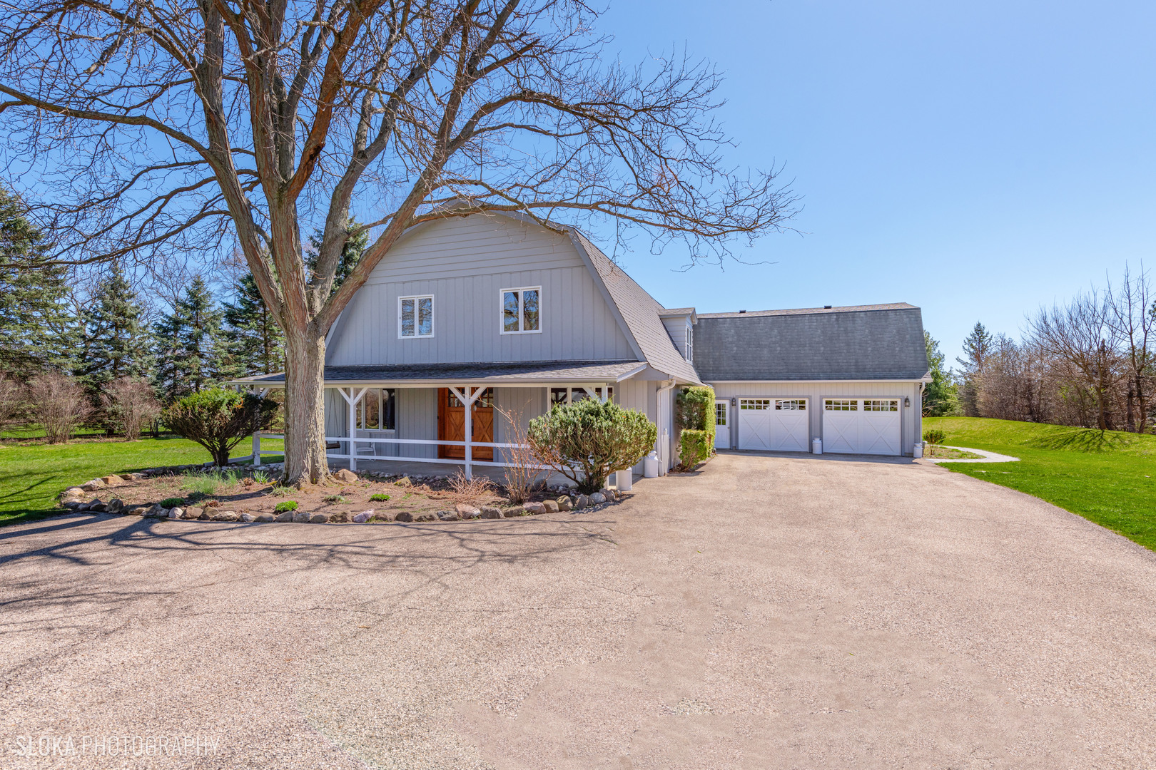 2401 West Wright Road Prairie Grove, IL 60012 - Photo 51 of 60 a front view of house with yard and trees