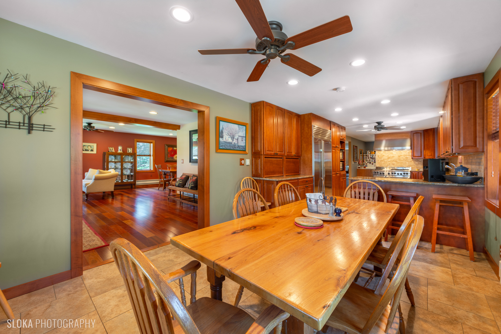 2401 West Wright Road Prairie Grove, IL 60012 - Photo 7 of 60 a view of a dining room with furniture and wooden floor