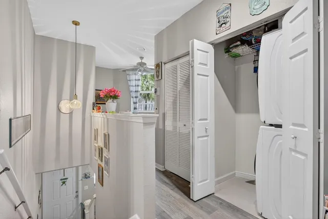 a bathroom with a shower and a sink