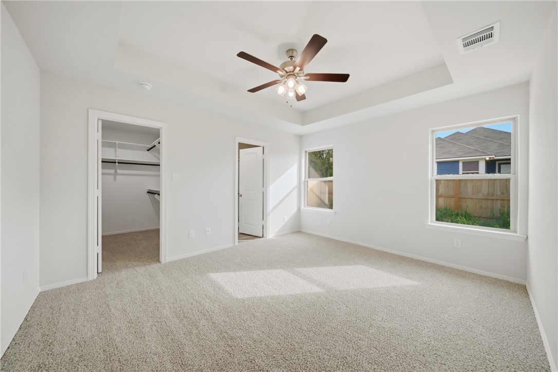 1220 High Street Navasota, TX 77868 - Photo 15 of 27 a view of a livingroom with a ceiling fan and window
