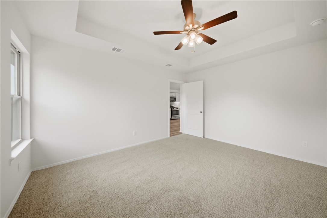 1220 High Street Navasota, TX 77868 - Photo 16 of 27 an empty room with closet and fan
