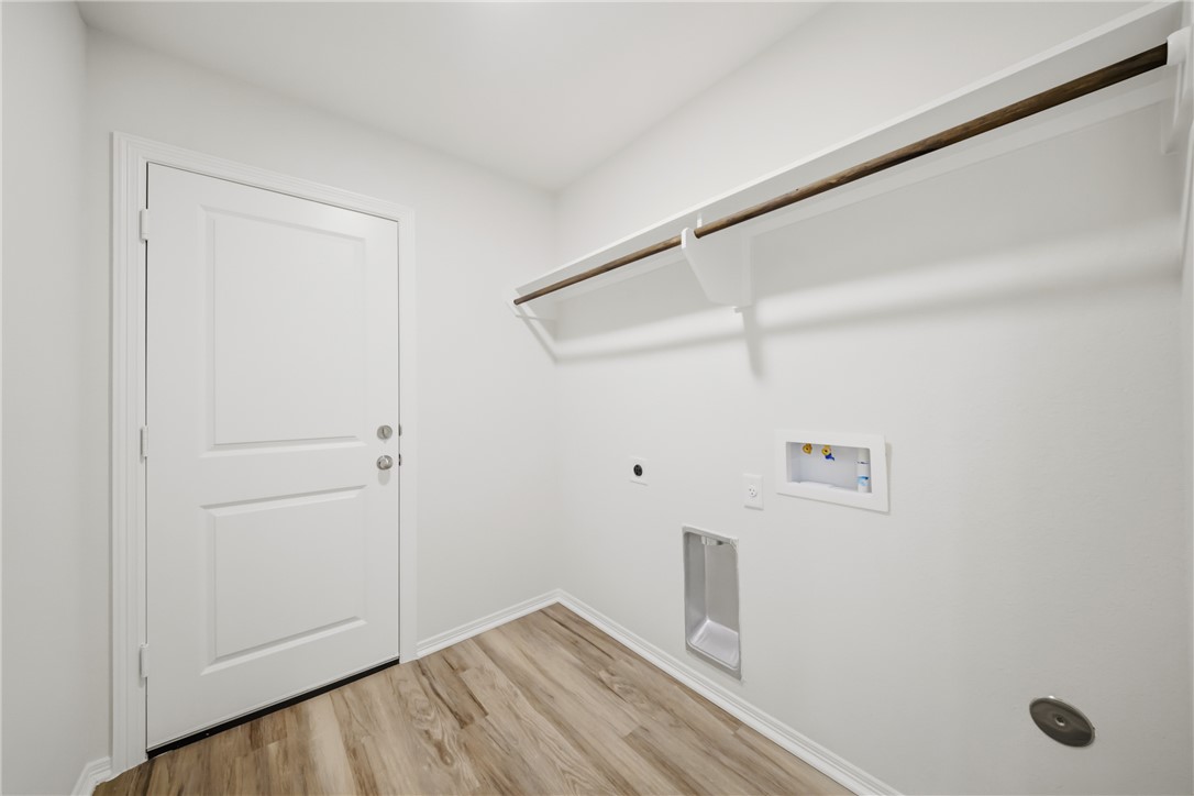 1220 High Street Navasota, TX 77868 - Photo 23 of 27 a view of small space with racks on the wall