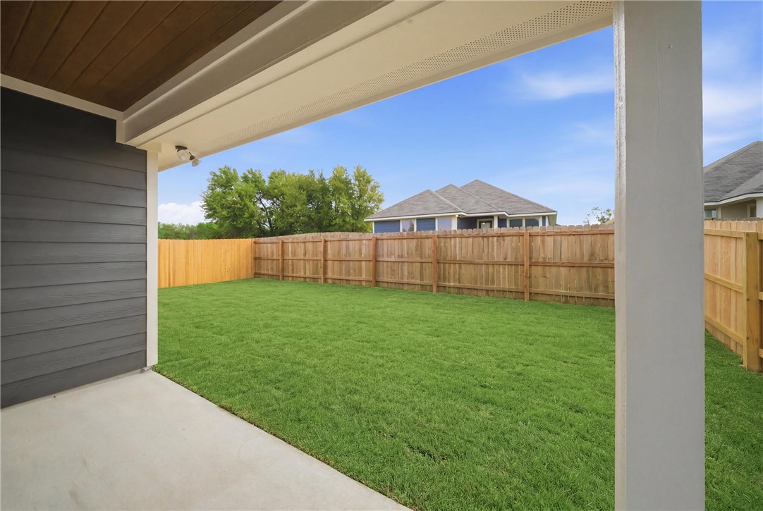 1220 High Street Navasota, TX 77868 - Photo 25 of 27 a view of a backyard with a garden and entertaining space