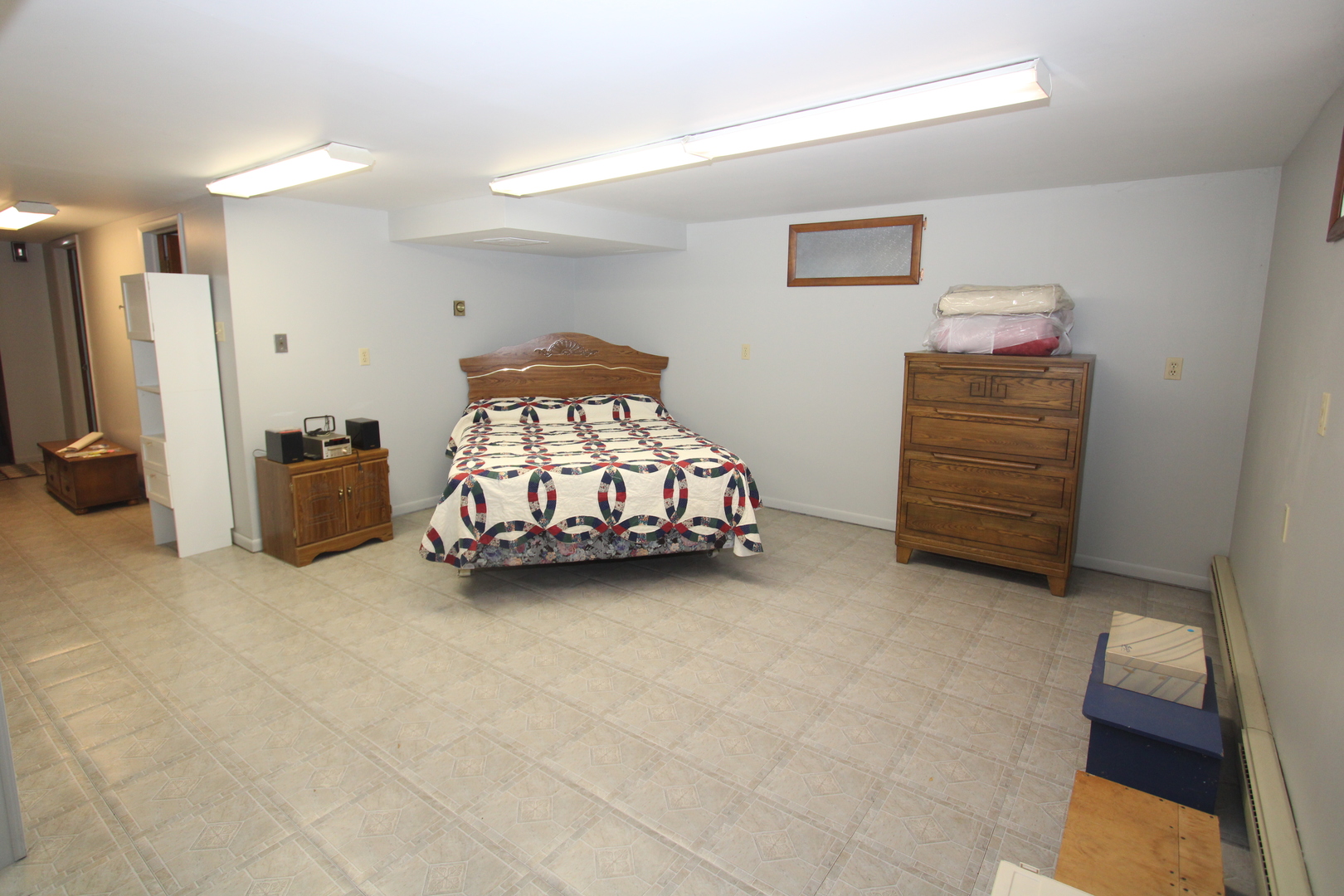 23815 Hickory Lane Minooka, IL 60447 - Photo 20 of 30 a bedroom with a bed and a cabinets