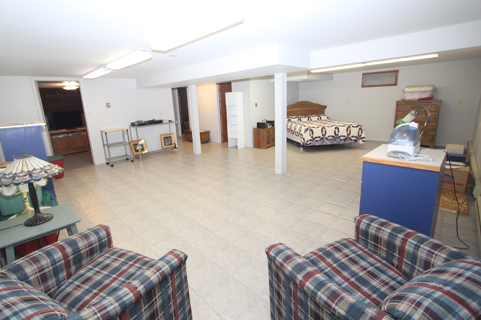 23815 Hickory Lane Minooka, IL 60447 - Photo 23 of 30 a bedroom with furniture and a wooden floor