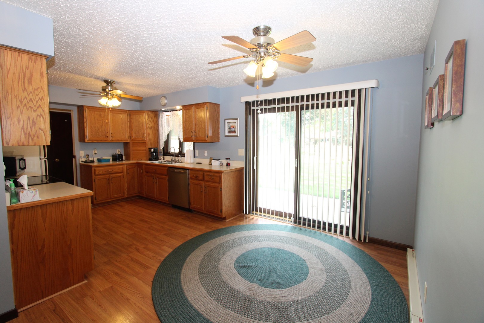 23815 Hickory Lane Minooka, IL 60447 - Photo 10 of 30 a view of a kitchen with a sink and a window