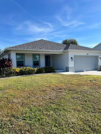 a front view of house with yard