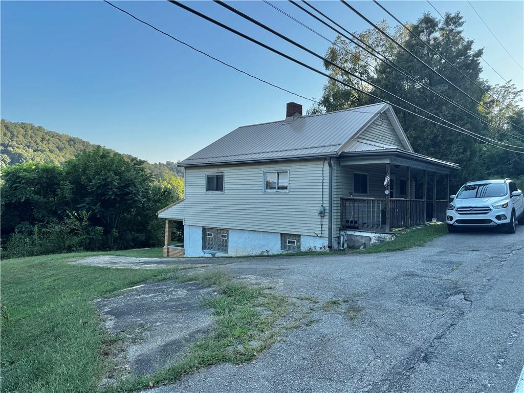 165 Low Hill Road Brownsville, PA 15417 - Photo 11 of 29 a house view with a garden space