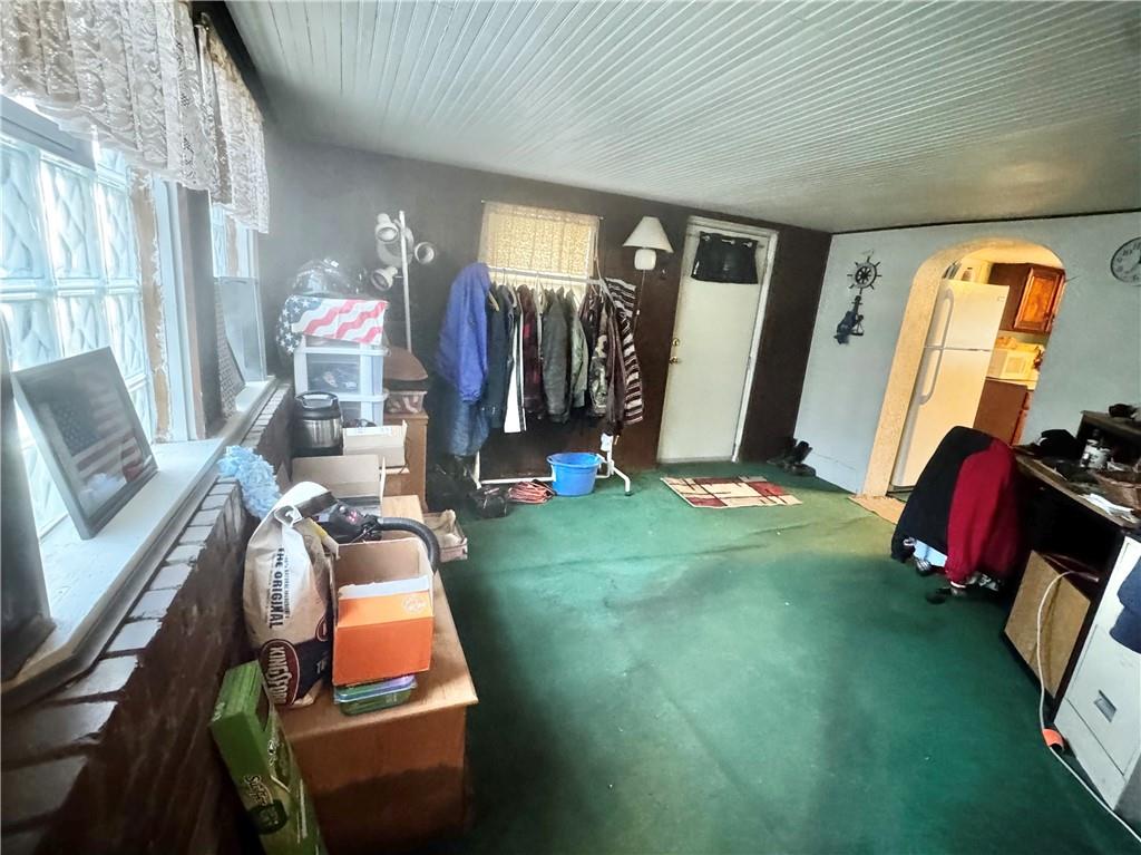 165 Low Hill Road Brownsville, PA 15417 - Photo 13 of 29 a living room with furniture and a flat screen tv