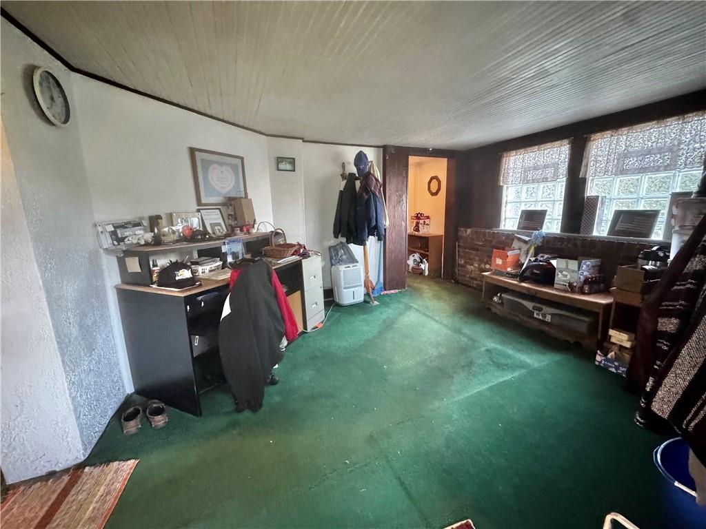 165 Low Hill Road Brownsville, PA 15417 - Photo 14 of 29 a living room with furniture and a flat screen tv