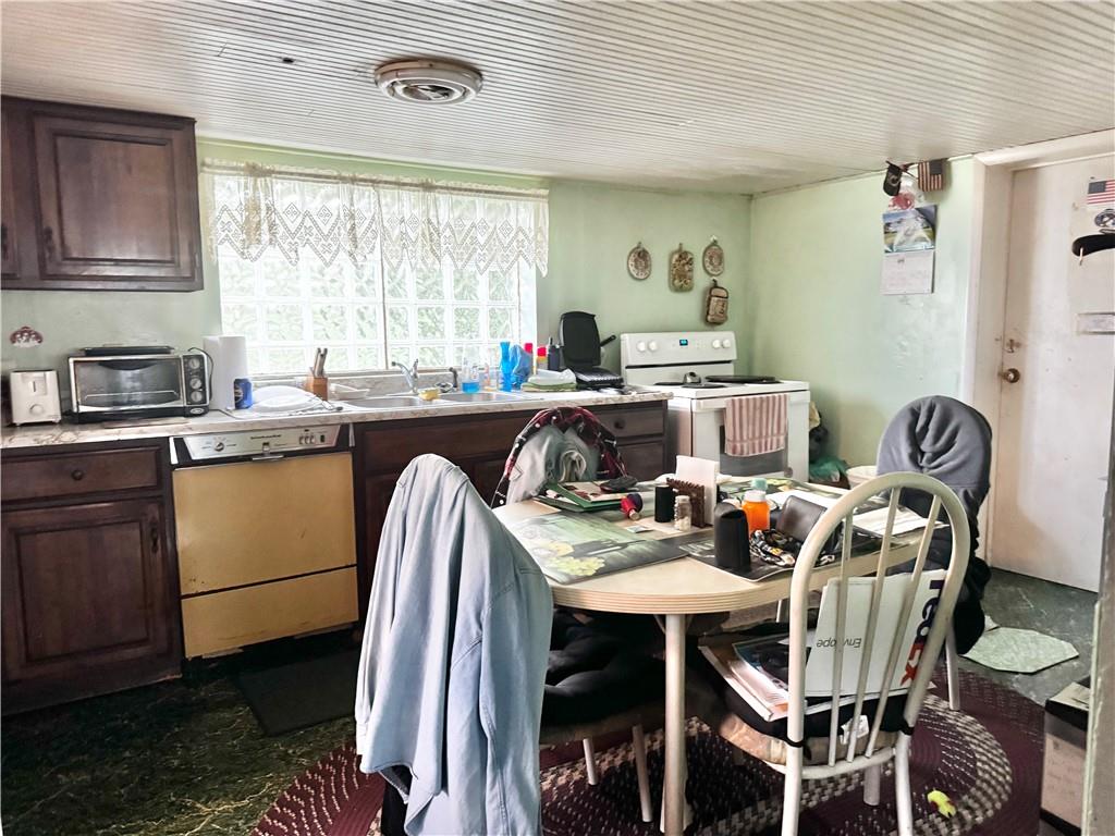 165 Low Hill Road Brownsville, PA 15417 - Photo 16 of 29 a view of a dining room with furniture window and outside view