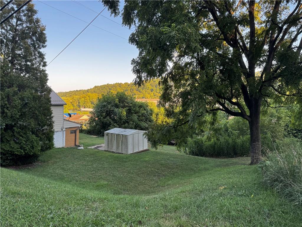 165 Low Hill Road Brownsville, PA 15417 - Photo 2 of 29 a house view with a garden space