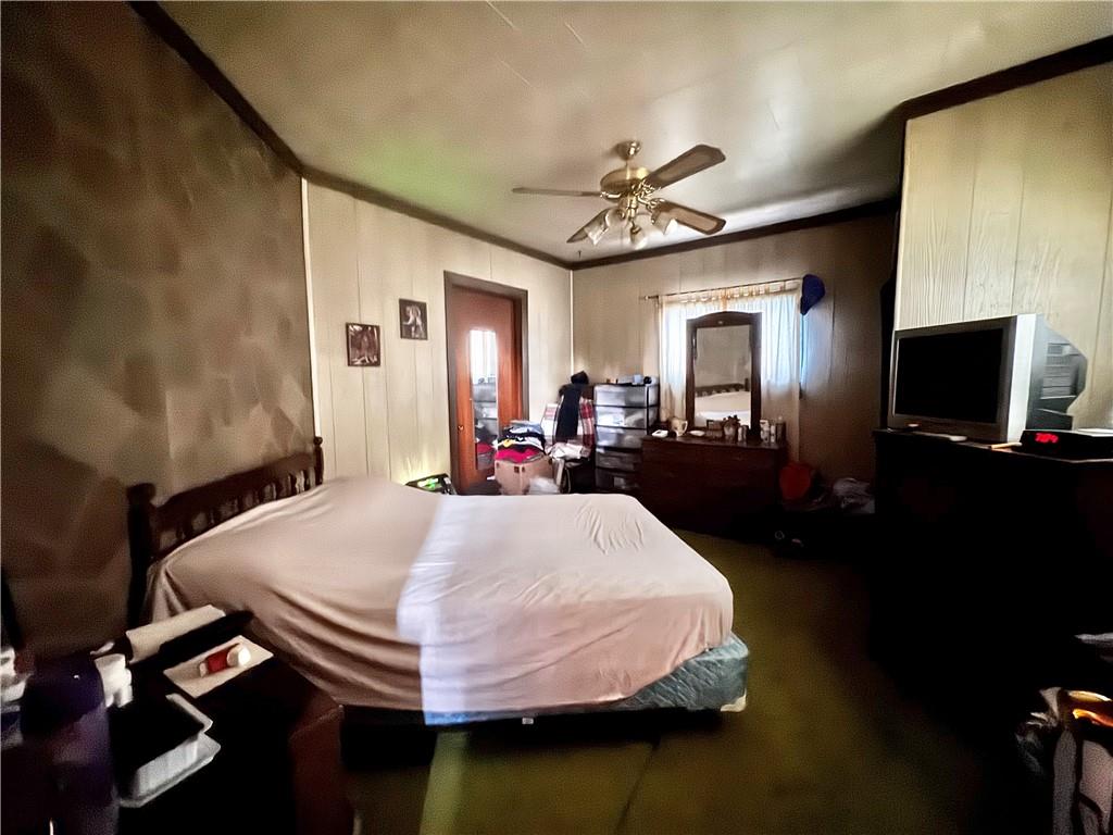 165 Low Hill Road Brownsville, PA 15417 - Photo 25 of 29 a bed room with a bed window and a mirror