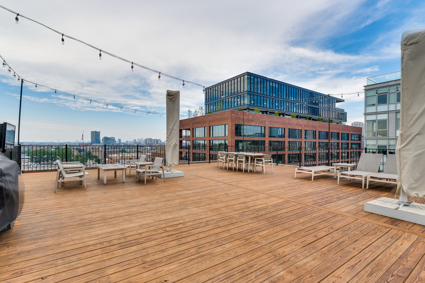 1101 West Lake Street, Unit 5D Chicago, IL 60607 - Photo 16 of 19 a view of a swimming pool with outdoor seating