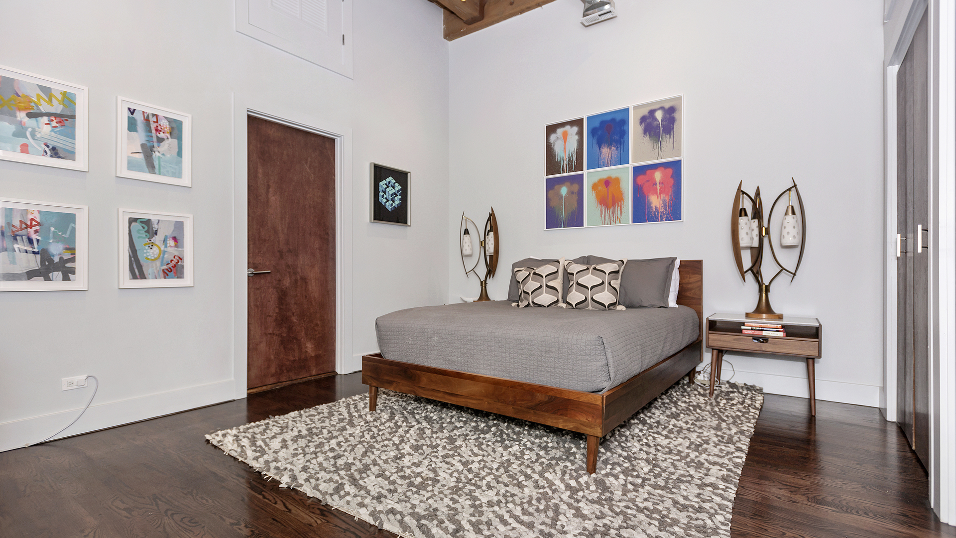 1101 West Lake Street, Unit 5D Chicago, IL 60607 - Photo 9 of 19 a bedroom with a bed and dresser