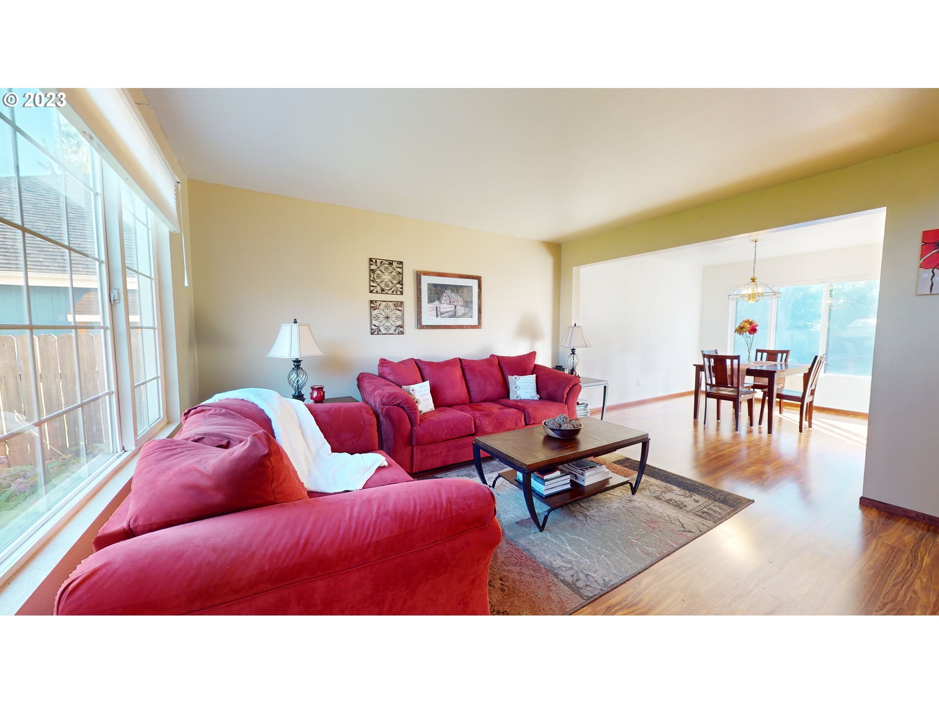862 South 45th Place Springfield, OR 97478 - Photo 3 of 36 a living room with furniture and wooden floor