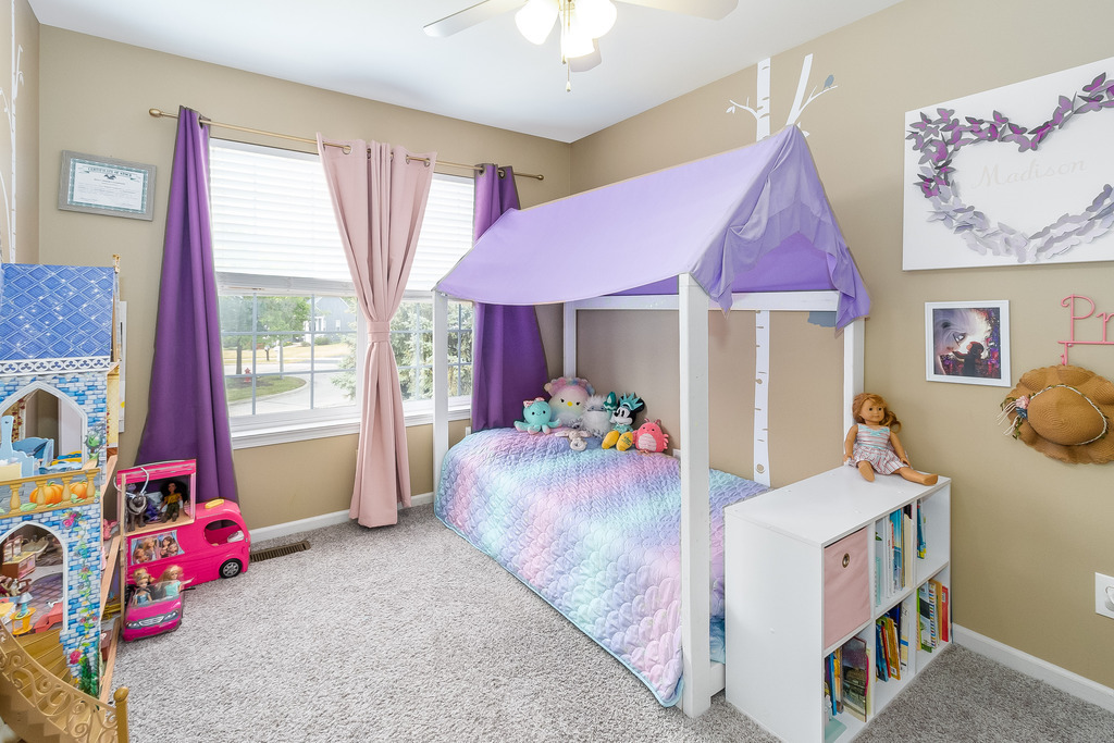 1950 Lakeside Drive Montgomery, IL 60538 - Photo 11 of 15 a bedroom with furniture and a window