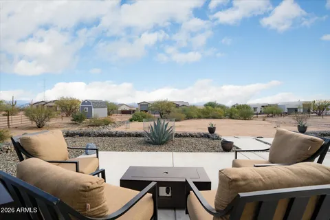 a view of a terrace with couches and a table