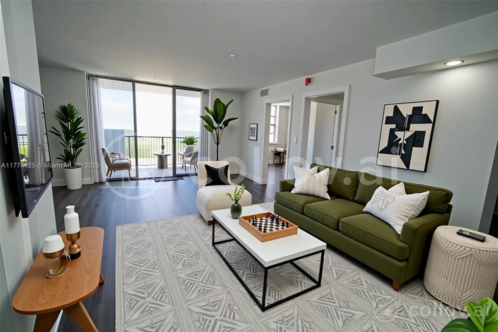 a living room with furniture fireplace and a large window