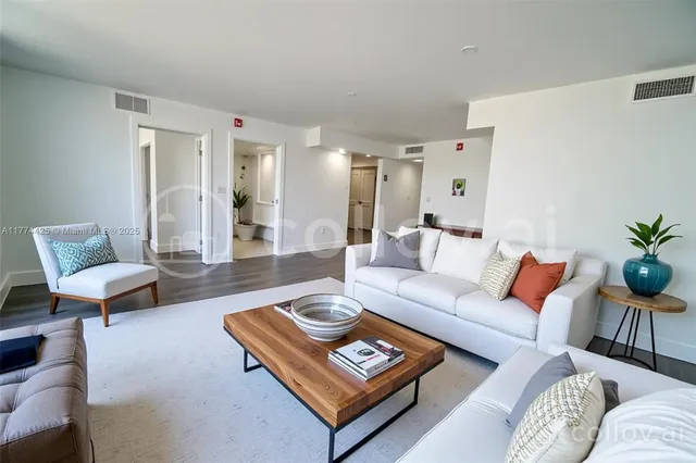 a living room with furniture and a couch