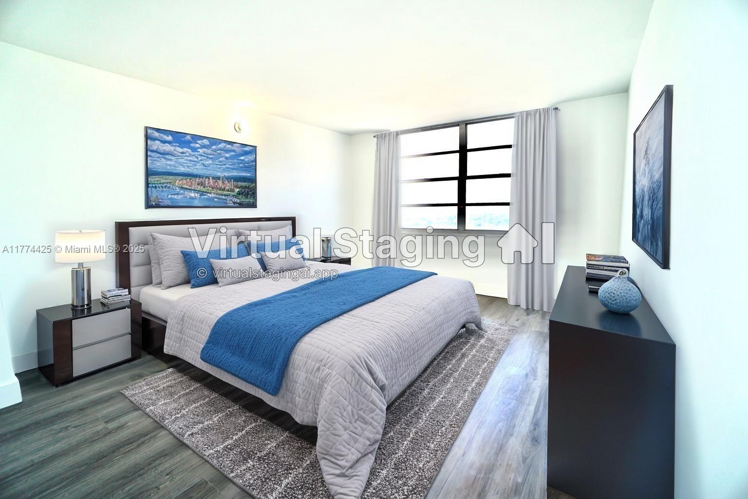 2750 Northeast 183rd Street, Unit 2304 Aventura, FL 33160 - Photo 6 of 12 a bedroom with a bed and glass windows