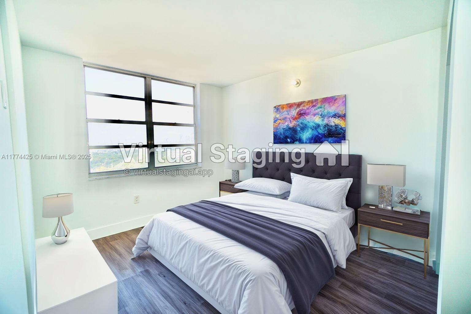 2750 Northeast 183rd Street, Unit 2304 Aventura, FL 33160 - Photo 8 of 12 a bedroom with bed and wooden floor