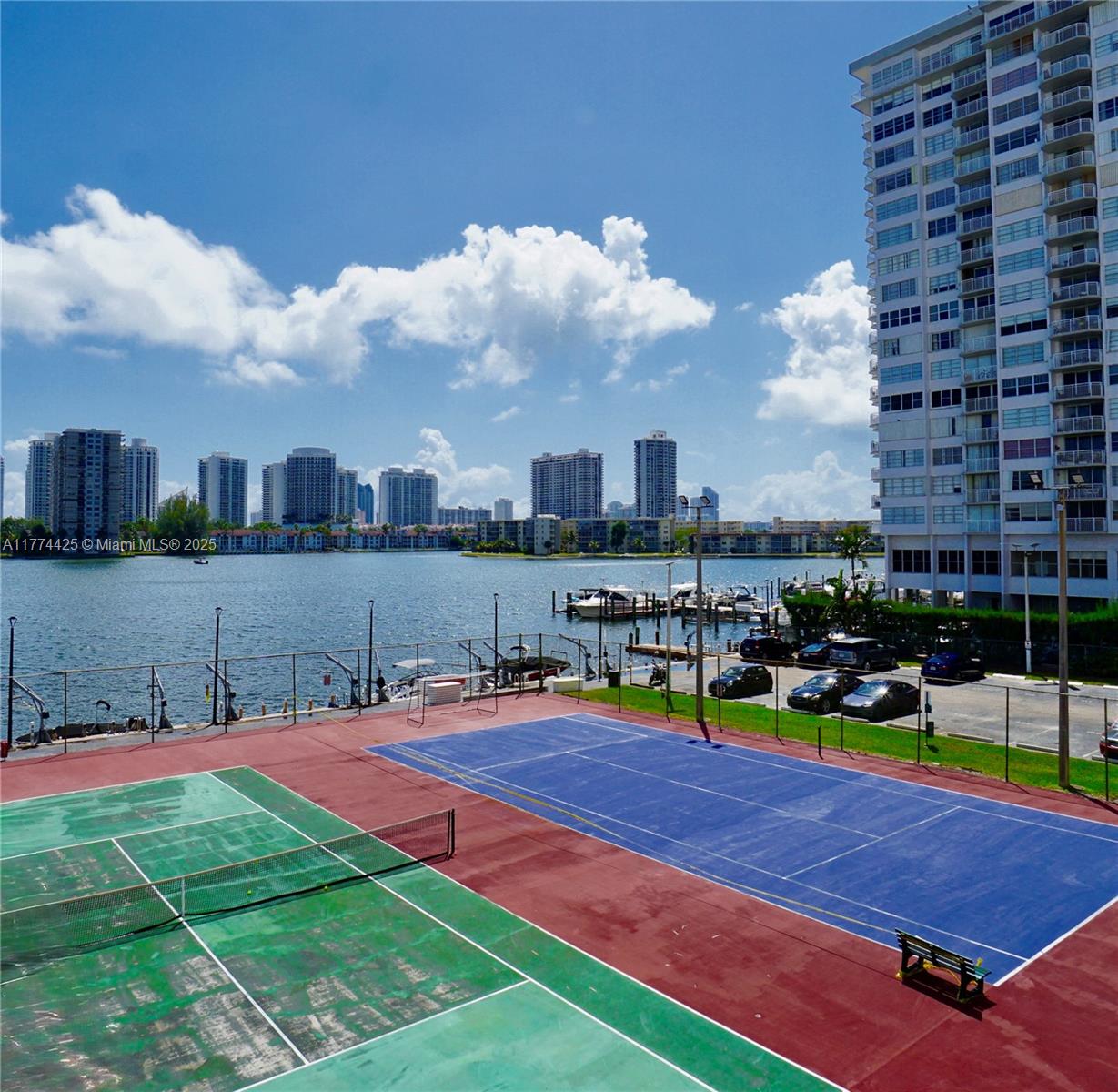2750 Northeast 183rd Street, Unit 2304 Aventura, FL 33160 - Photo 10 of 12 a view of a tennis ground