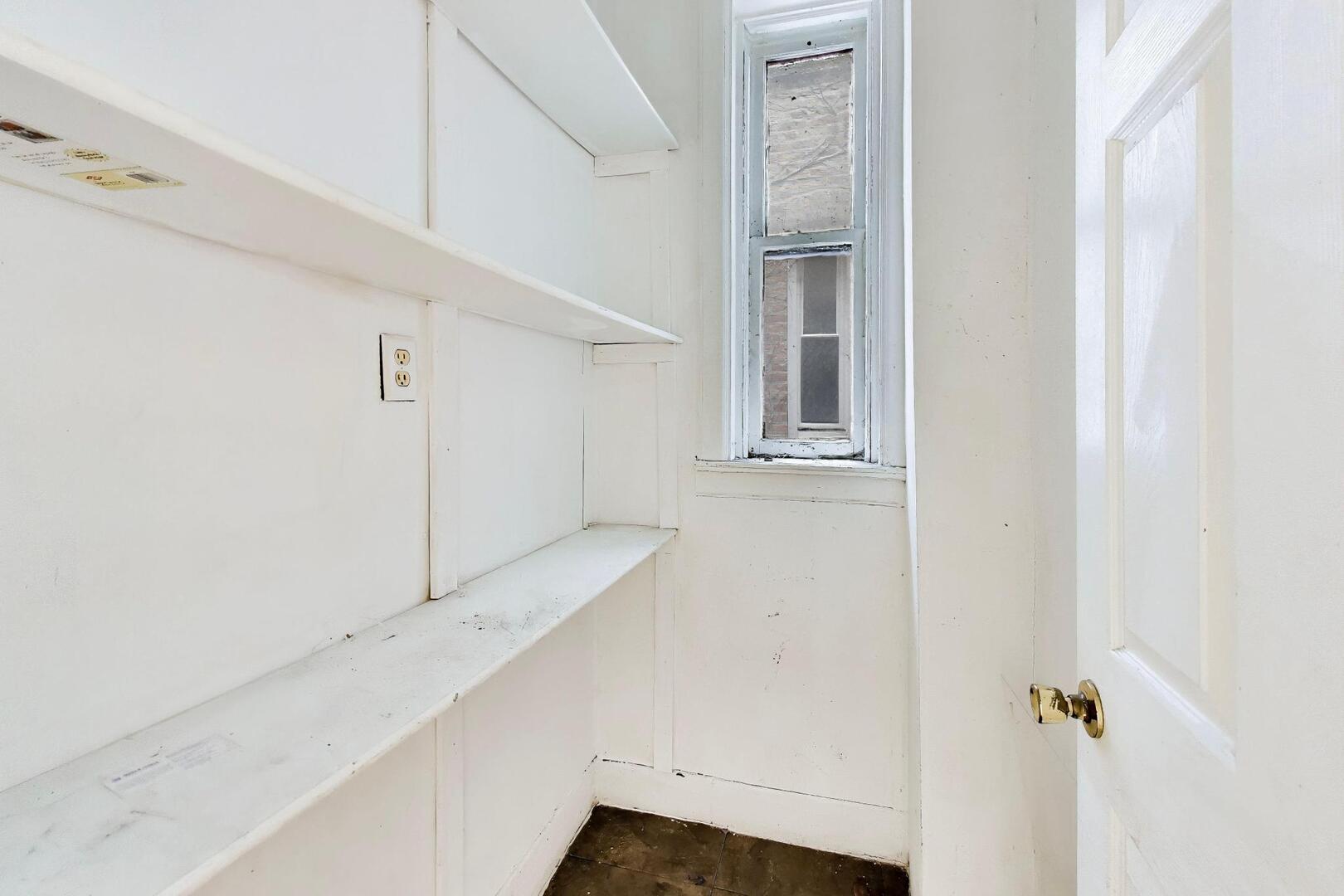 4505 South Indiana Avenue Chicago, IL 60653 - Photo 14 of 31 a view of an empty walk in closet