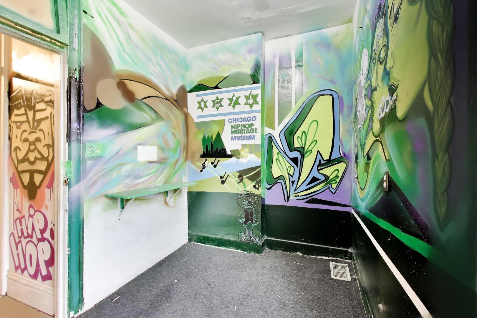 4505 South Indiana Avenue Chicago, IL 60653 - Photo 27 of 31 a sign that is on the wall of building