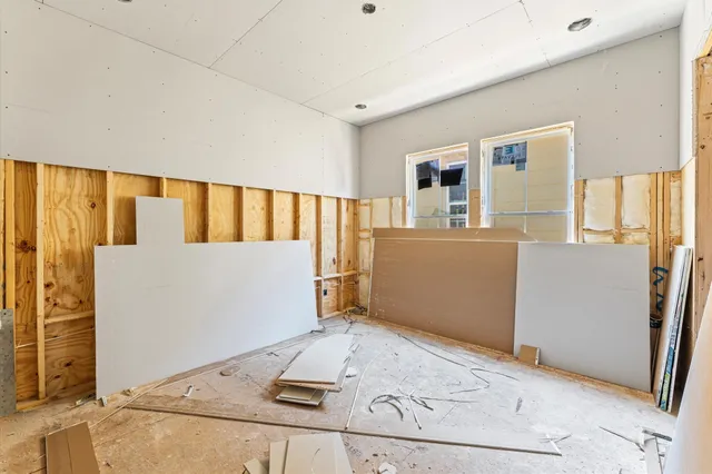 a living room with a couch and a table