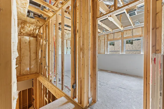 a view of a door and a window