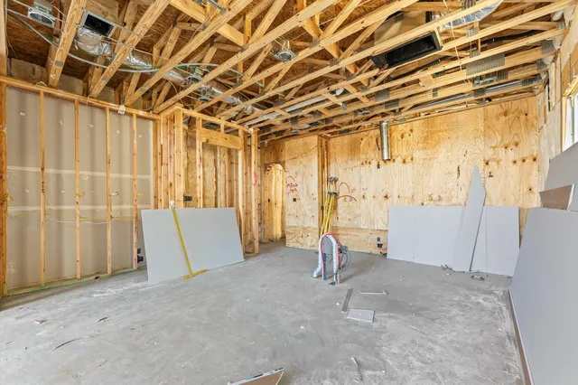 a view of a room with wooden walls