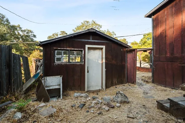 a backyard of a house with seating space