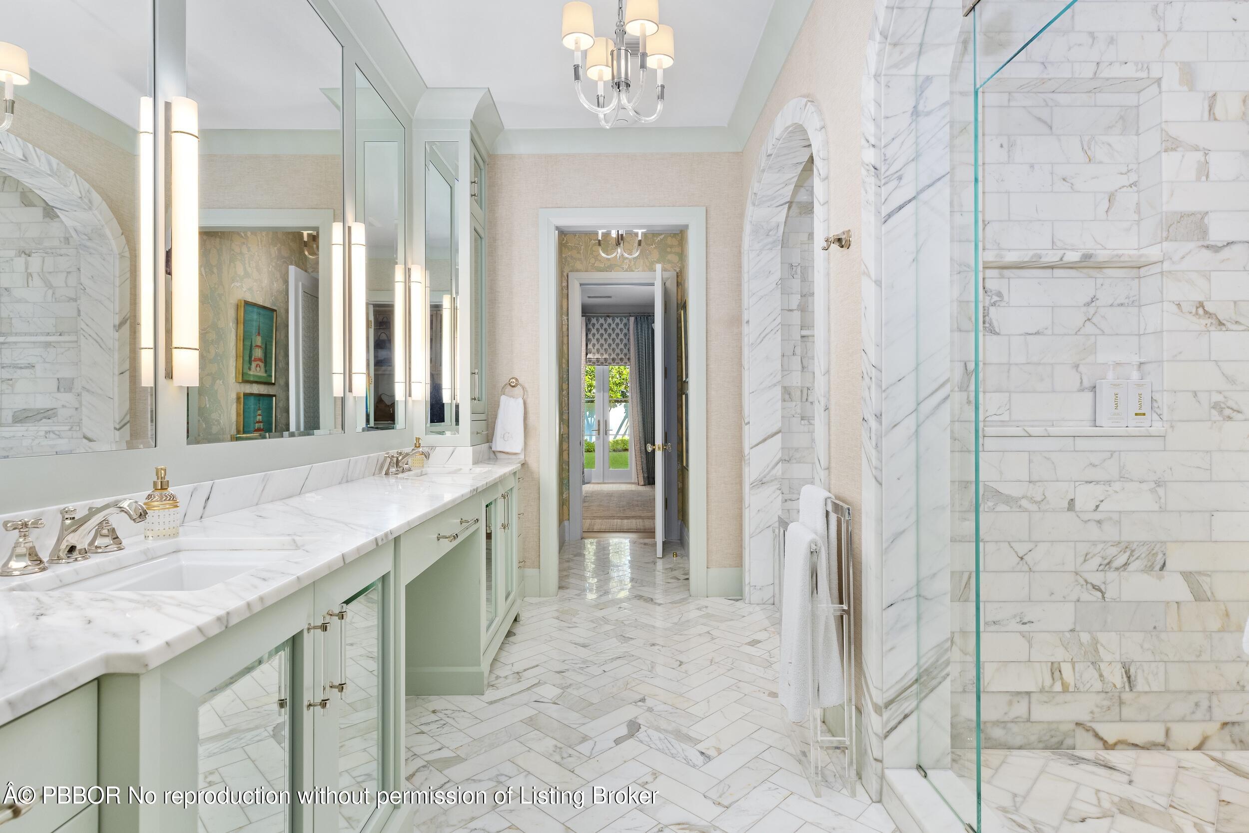 309 Chapel Hill Road Palm Beach, FL 33480 - Photo 25 of 50 a bathroom with a granite countertop sink a mirror and a shower
