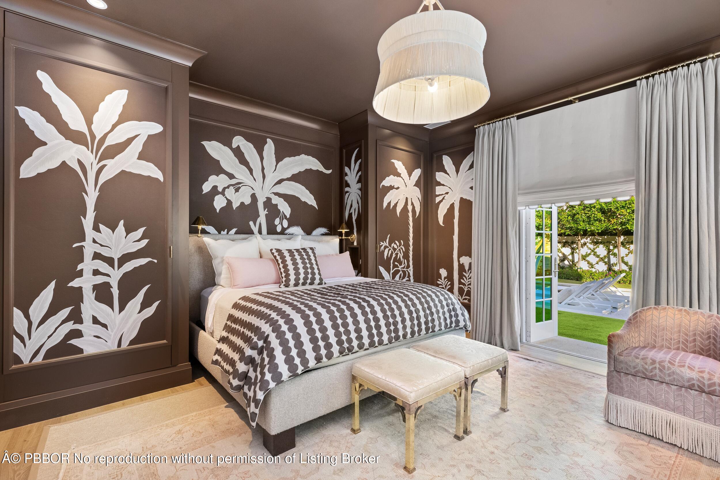 309 Chapel Hill Road Palm Beach, FL 33480 - Photo 27 of 50 a living room with furniture and a large window