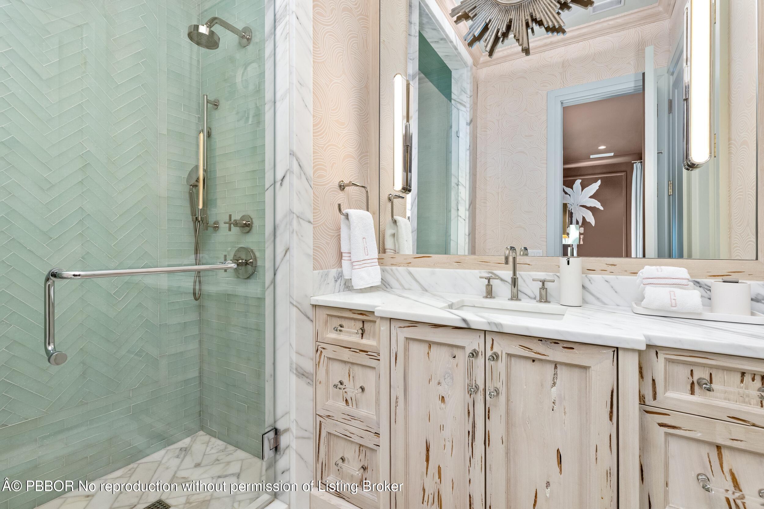 309 Chapel Hill Road Palm Beach, FL 33480 - Photo 30 of 50 a bathroom with a granite countertop sink a mirror and shower