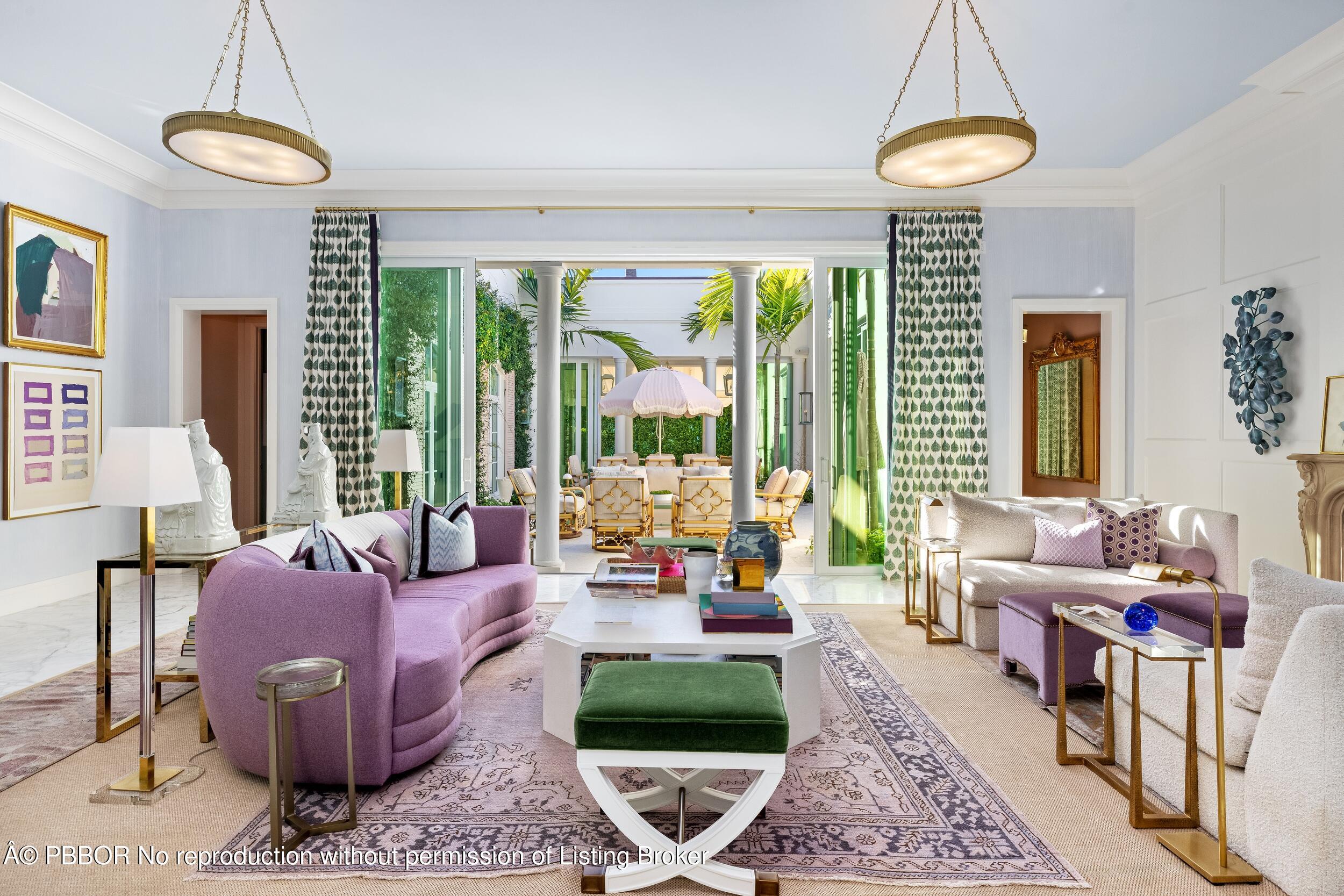 309 Chapel Hill Road Palm Beach, FL 33480 - Photo 5 of 50 a living room with furniture and a large window