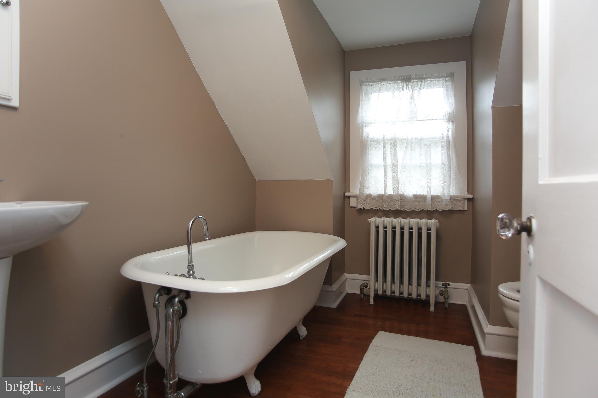 213 Hewett Road Wyncote, PA 19095 - Photo 31 of 40 Hall bath (3rd floor) with clawfoot tub