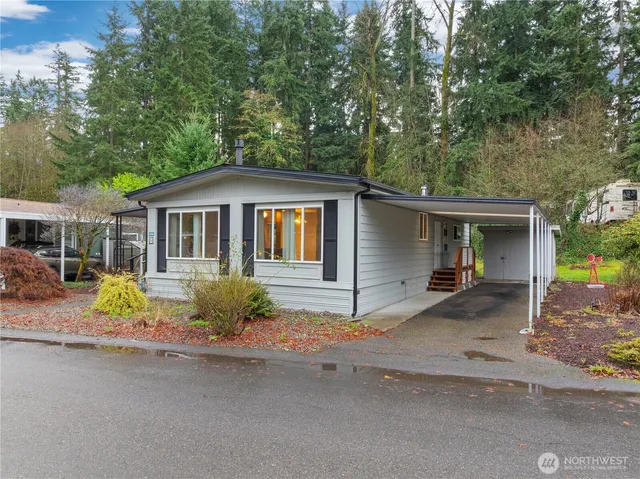 a front view of a house with a sitting space