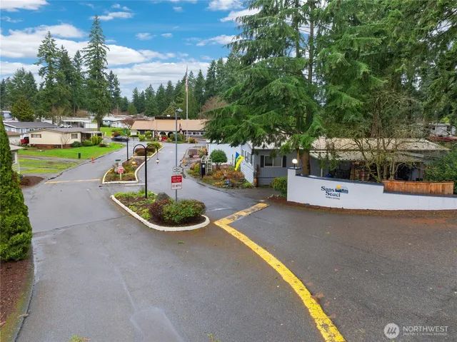 a view of a swimming pool with a patio