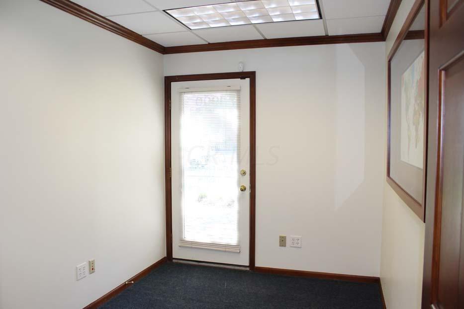 1900 Bethel Road Columbus, OH 43235 - Photo 2 of 24 New blue carpet ~02. Ivory painted walls. Suspended ceiling. Fluorescent lighting.
