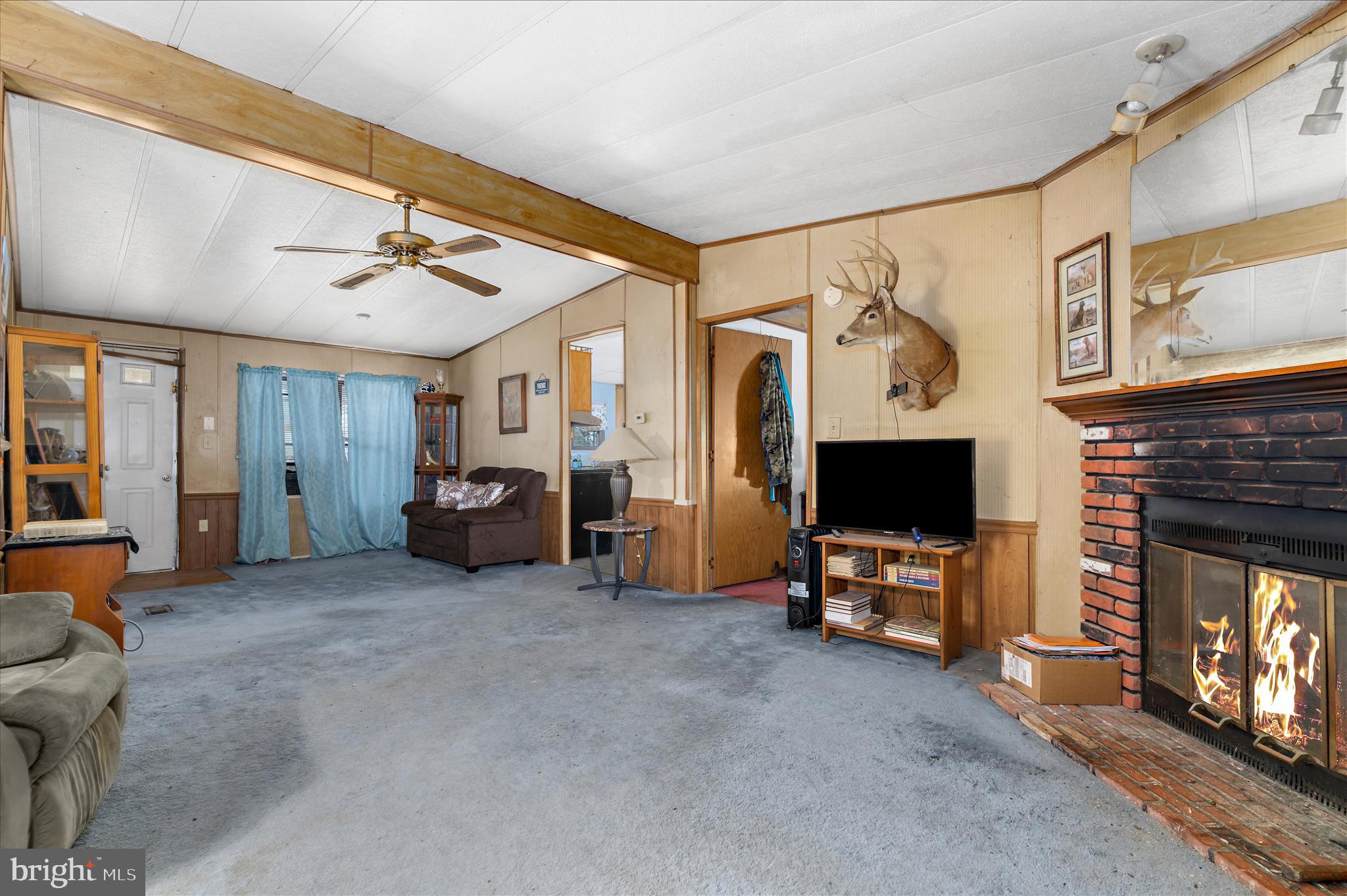 151 Darlington Road Havre de Grace, MD 21078 - Photo 17 of 46 a view of a livingroom with furniture and a flat screen tv