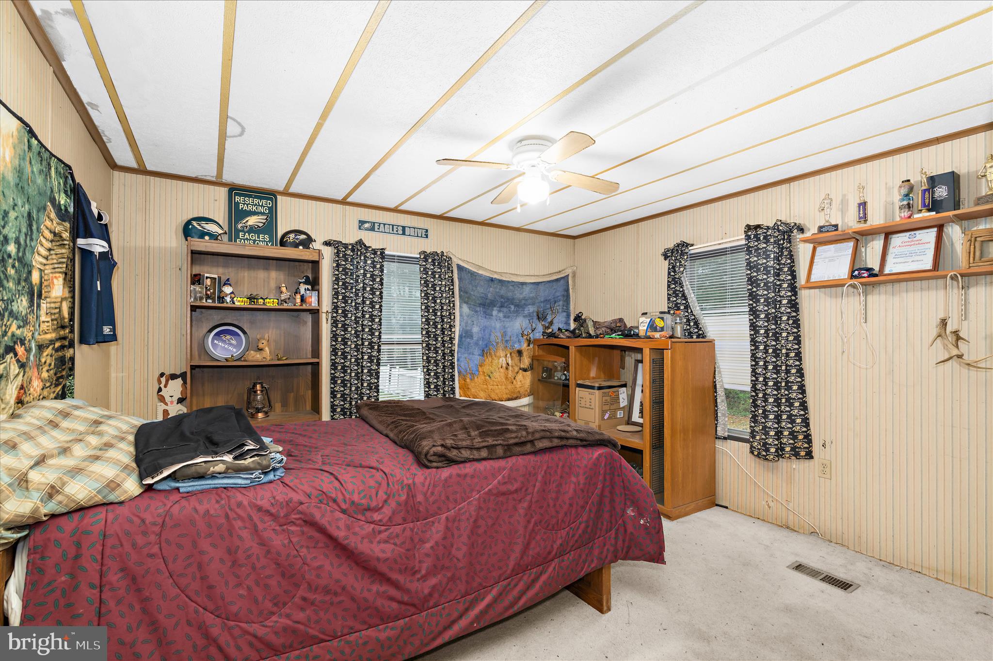151 Darlington Road Havre de Grace, MD 21078 - Photo 22 of 46 a bedroom with a bed a standing dresser and the view of the bathroom