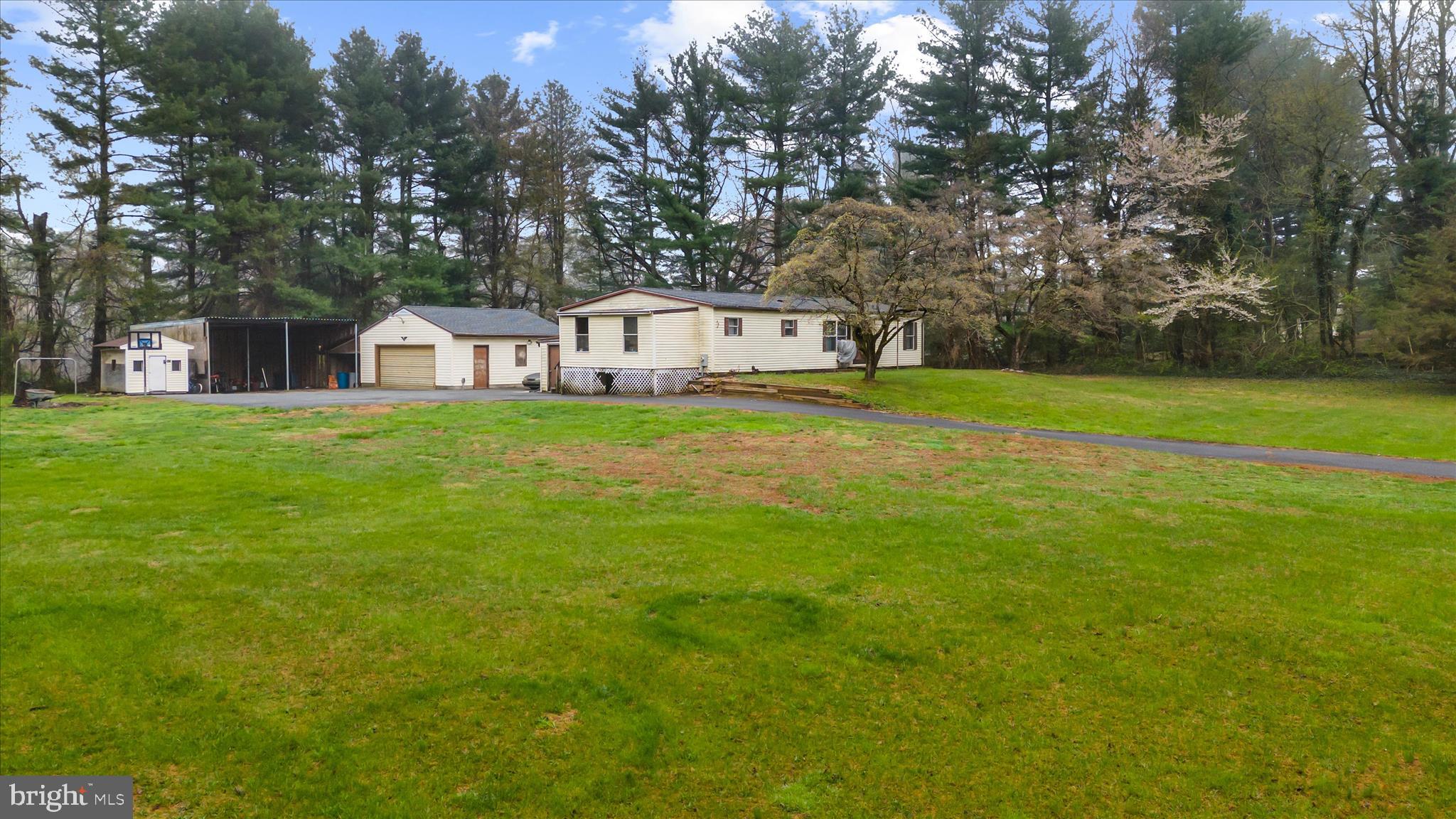 151 Darlington Road Havre de Grace, MD 21078 - Photo 3 of 46 a front view of a house with a yard and trees