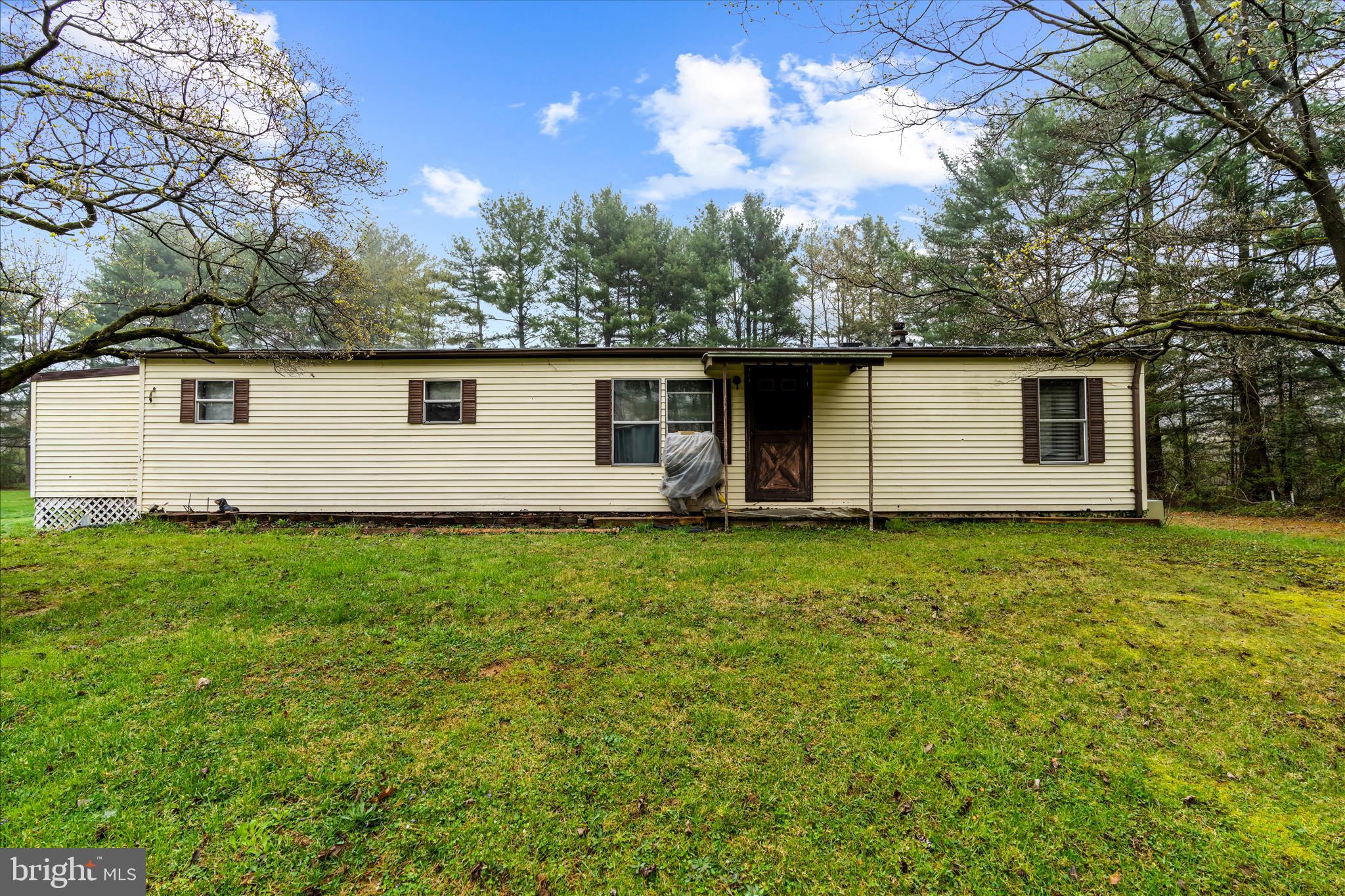151 Darlington Road Havre de Grace, MD 21078 - Photo 41 of 46 a backyard of a house with plants and large tree