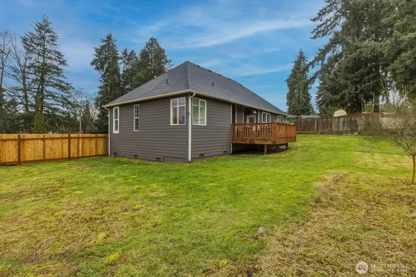 a backyard of a house with lots of green space