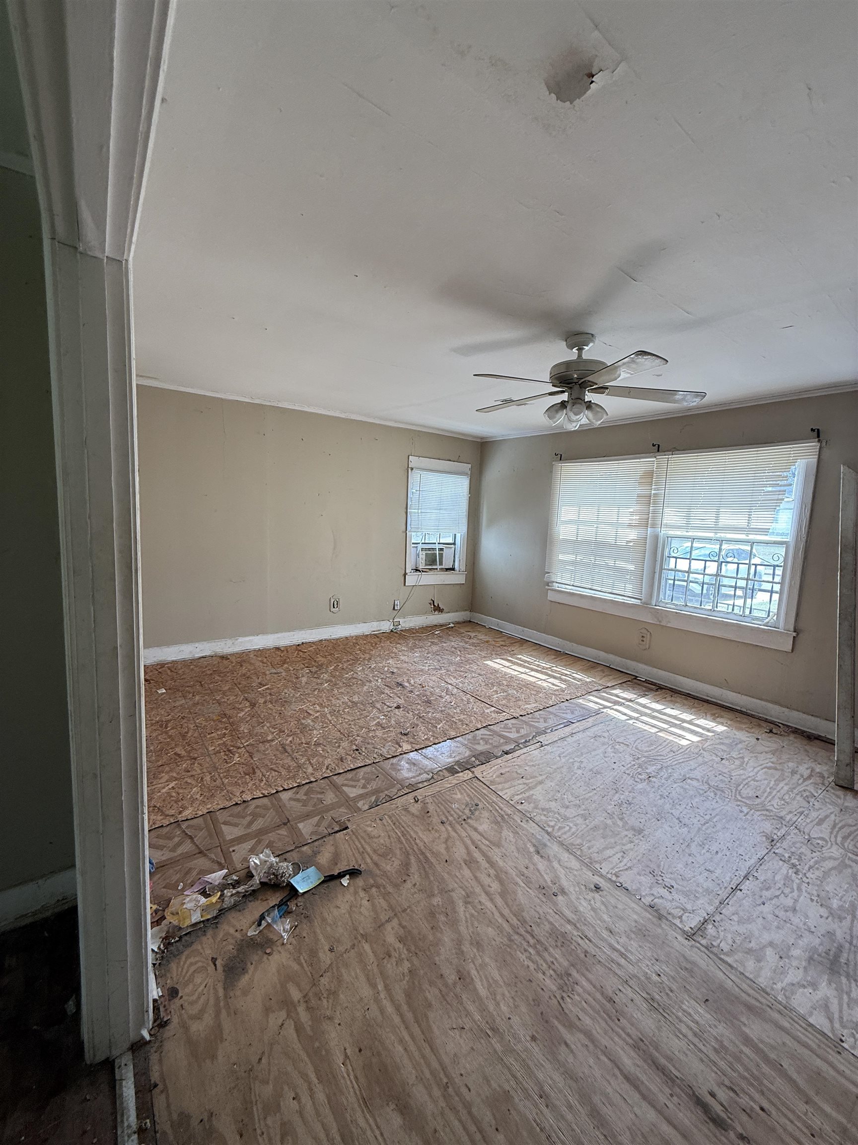 66 East Rollins Road Memphis, TN 38109 - Photo 7 of 31 Unfurnished room featuring baseboards and ceiling fan