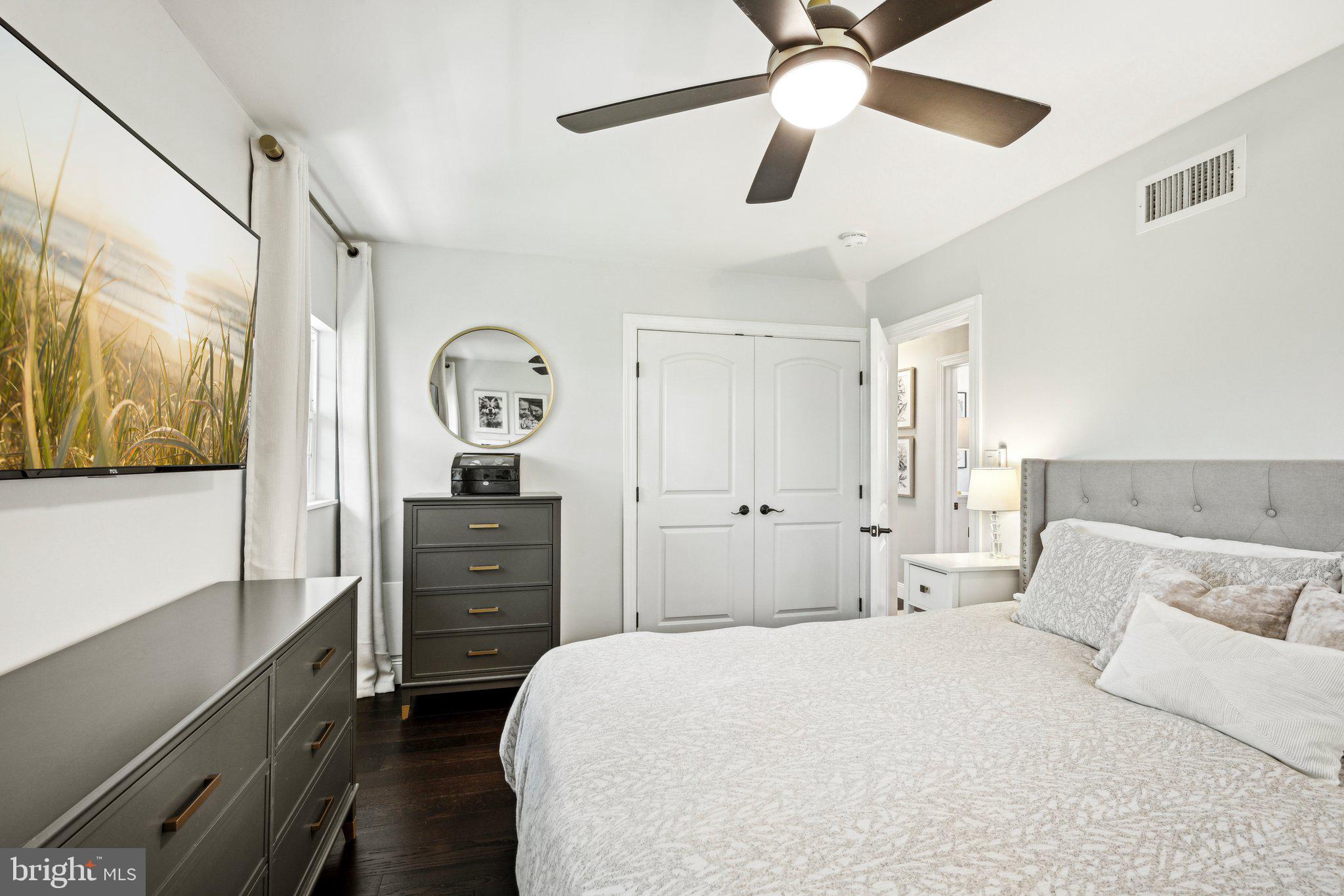 42 Cameo Road Claymont, DE 19703 - Photo 15 of 37 a bedroom with a bed and a chandelier