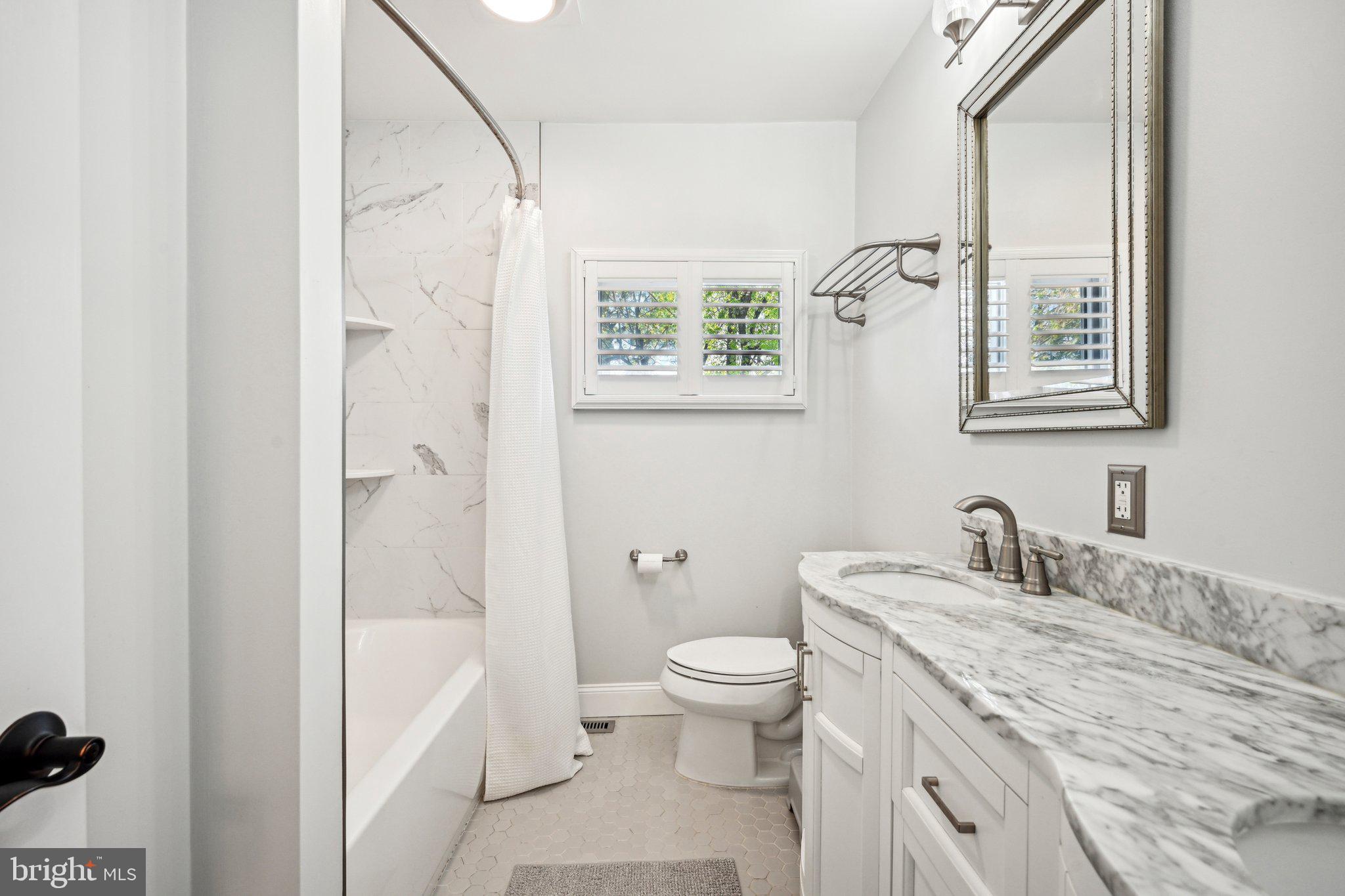 42 Cameo Road Claymont, DE 19703 - Photo 20 of 37 a bathroom with a granite countertop sink toilet and shower